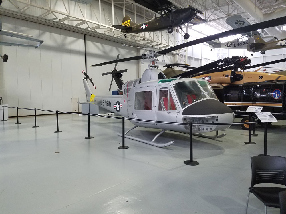 U.S. Army helicopter exhibit inside the U.S. Army Aviation Museum.